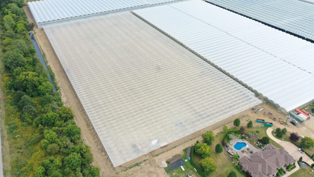 Aerial photo of H&A Farms greenhouse construction before exterior walls are installed